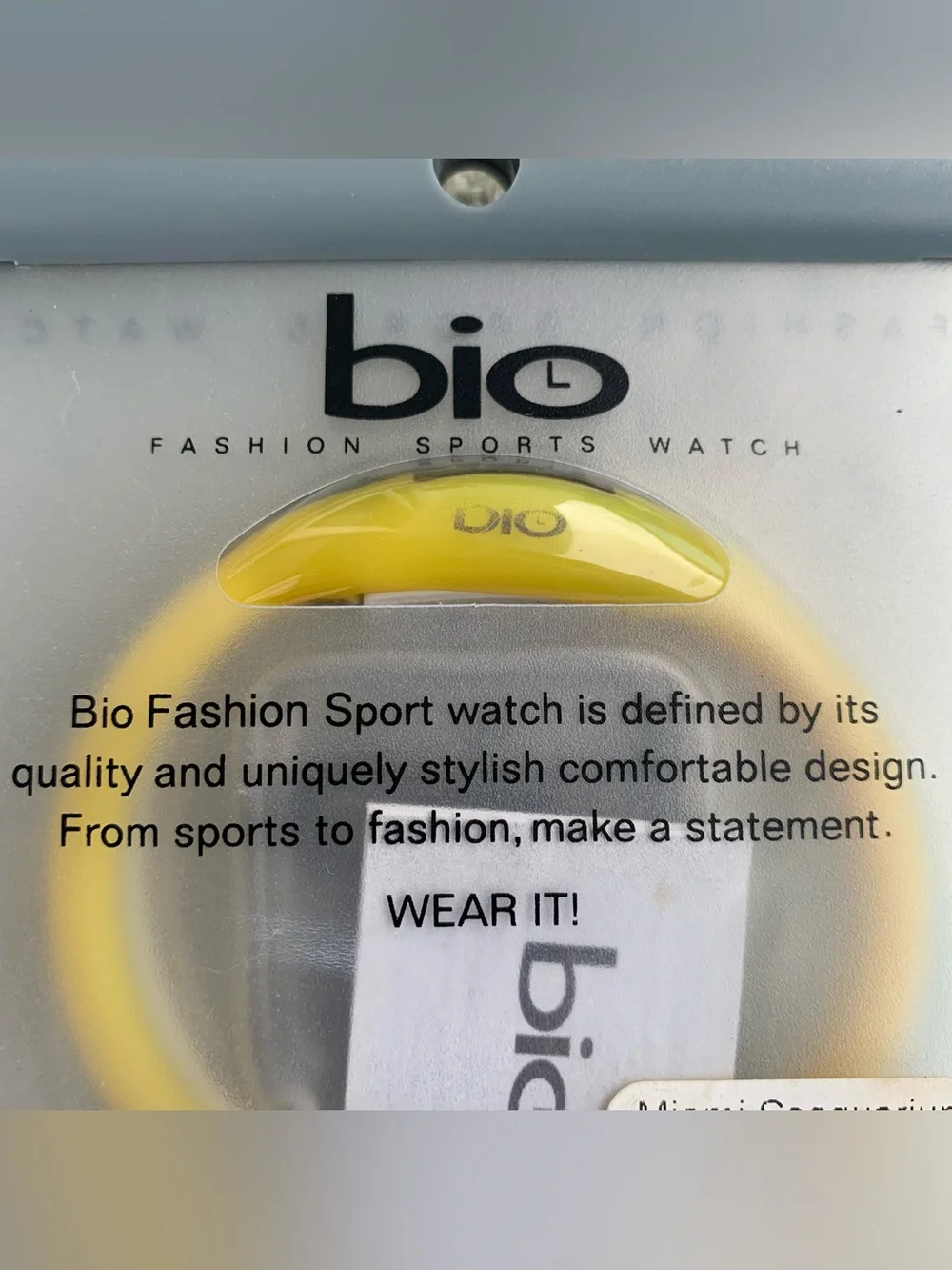yellow Bio digital sports watch inside its translucent packaging